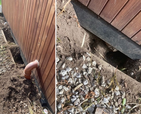 A fox hole dug under a garden office